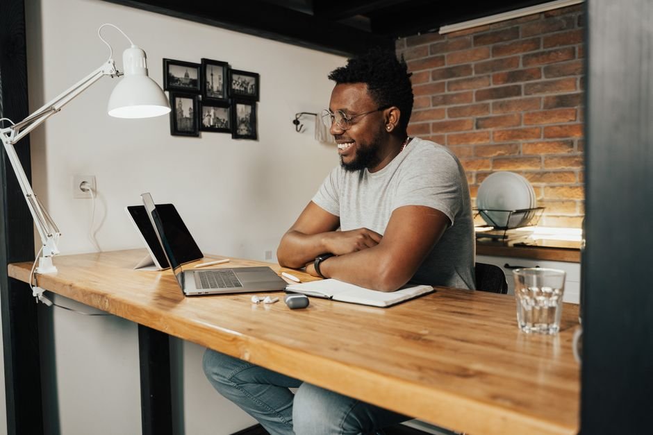 A professional working remotely in the UK