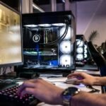 High-performance gaming computers arranged at an esports event