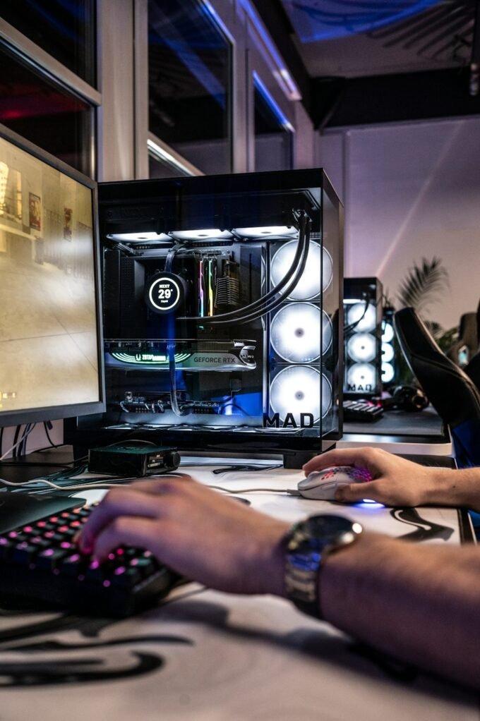 High-performance gaming computers arranged at an esports event