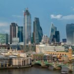 Modern skyscrapers in London’s financial district representing UK markets