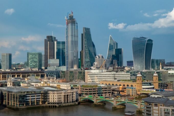 Modern skyscrapers in London’s financial district representing UK markets
